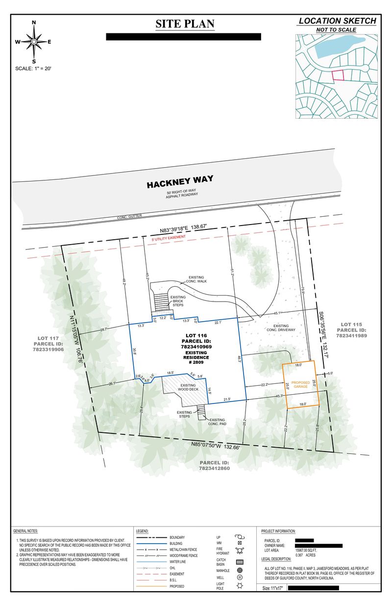 Sample detached garage site plan with the proposed garage dimensioned behind the residence, owner details redacted
